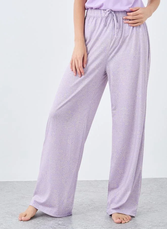 Styli Notch Neck Placket Lace Back T-Shirt and Leopard Pyjama Set