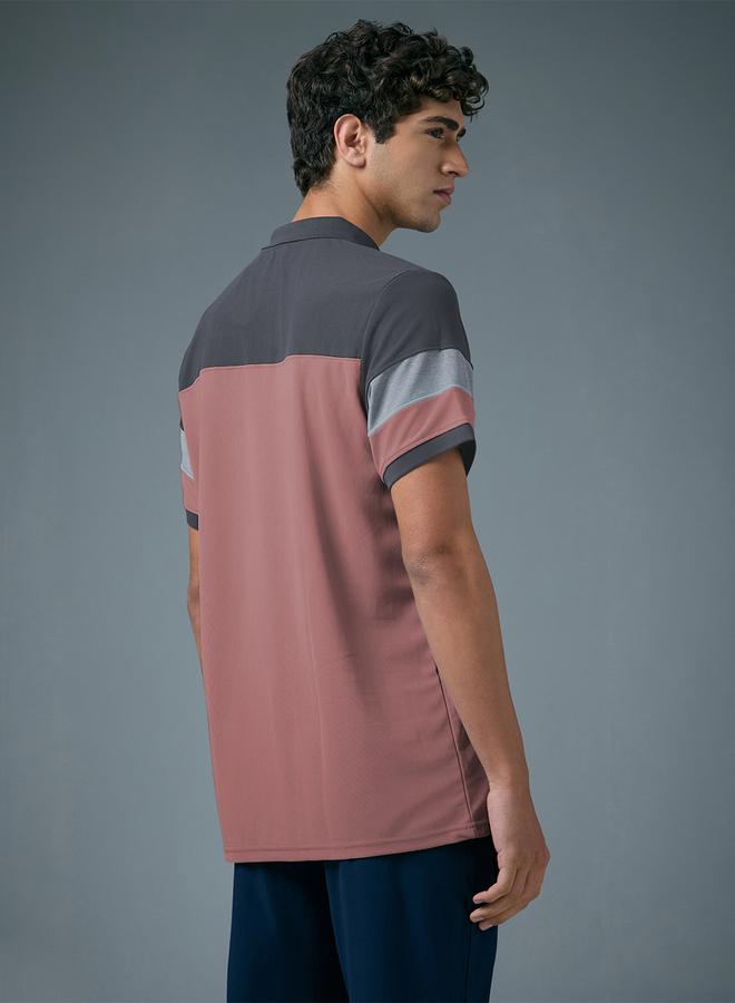 تكنوسبورت بولو بيكيه بقصة ضيقة ونمط كتل الالوان - Image 2