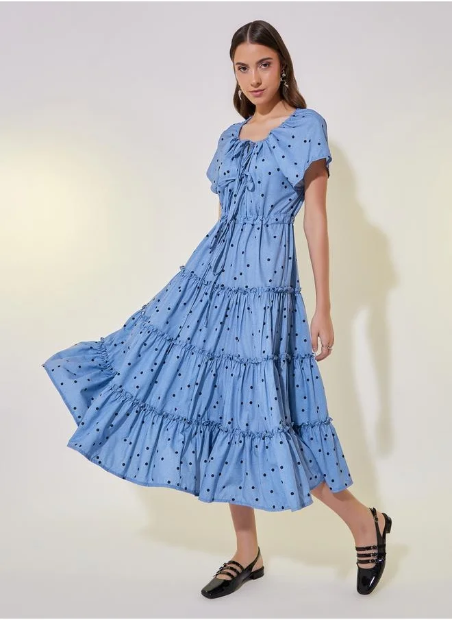 Styli All-Over Print Puff Sleeve Tiered Midi Dress with Bow Tie-Up Detail