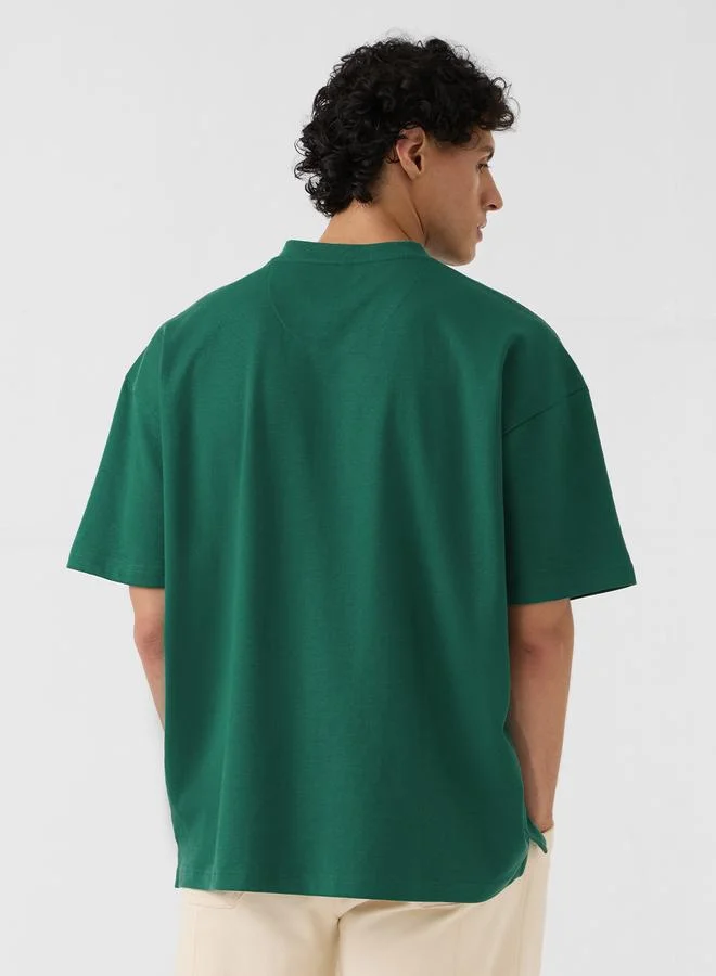 ذا سوليد ستور تيشيرت قطن بقصة واسعة