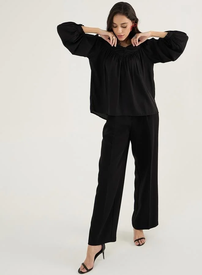 Femmella Femmella Solid Balloon Sleeve Pleated Top with Button Detail