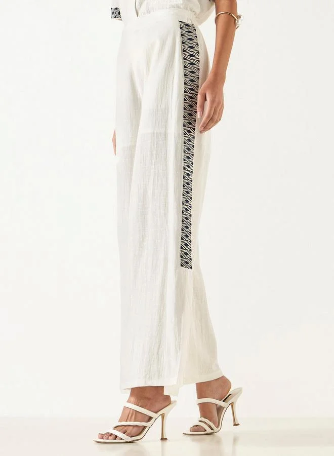 تواكستريمز بنطلون واسع الساقين بتطريزات من تو إكستريمز