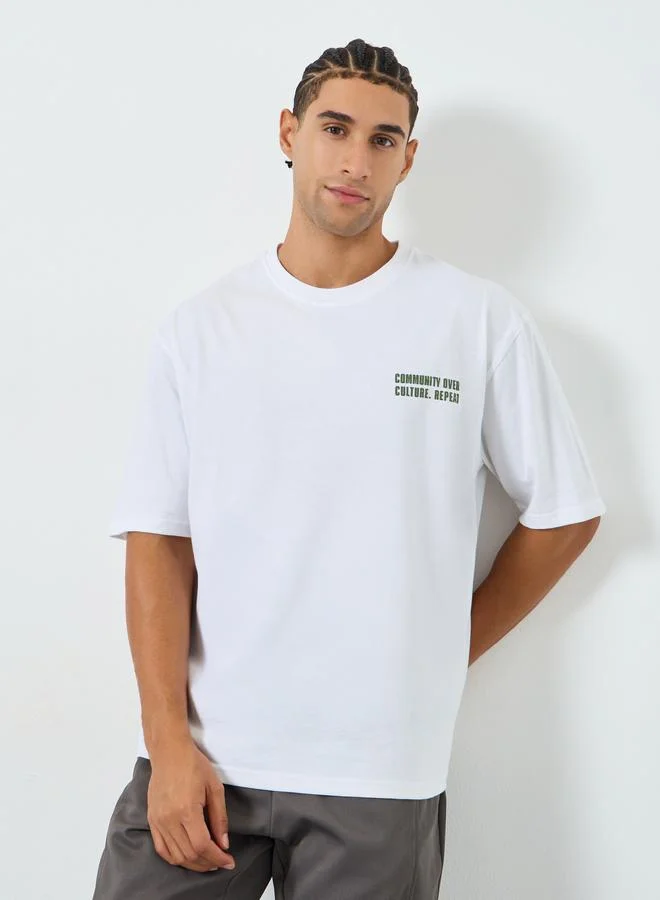 Styli Men White Oversized Slogan T-Shirt