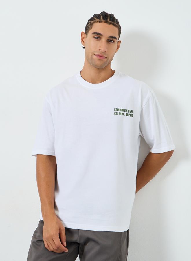 Styli Men White Oversized Slogan T-Shirt - Image 1