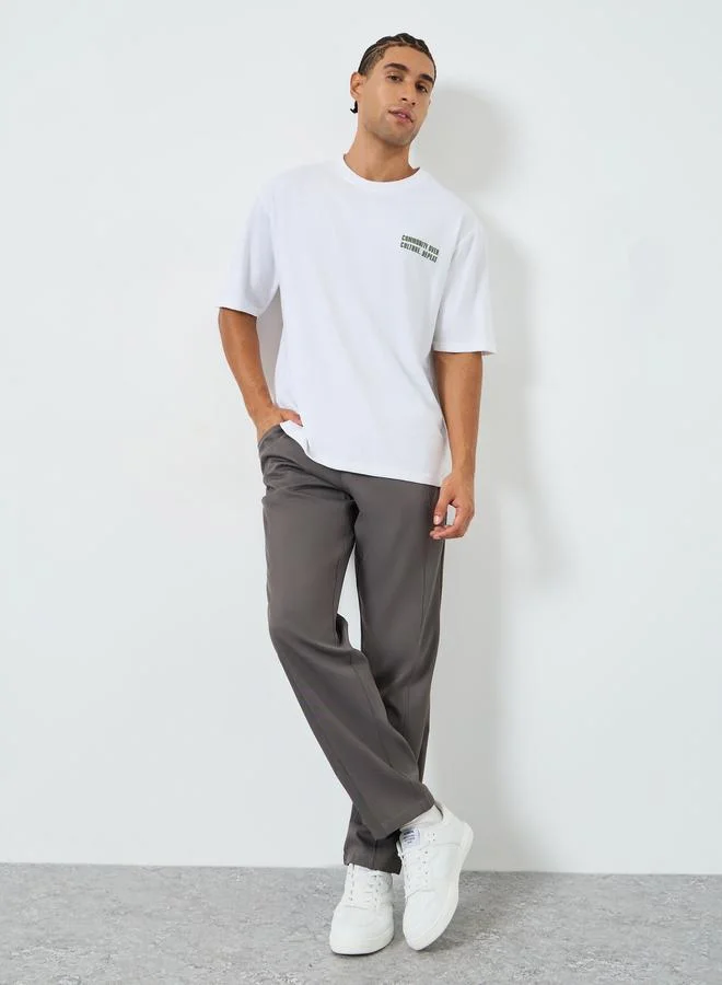 Styli Men White Oversized Slogan T-Shirt