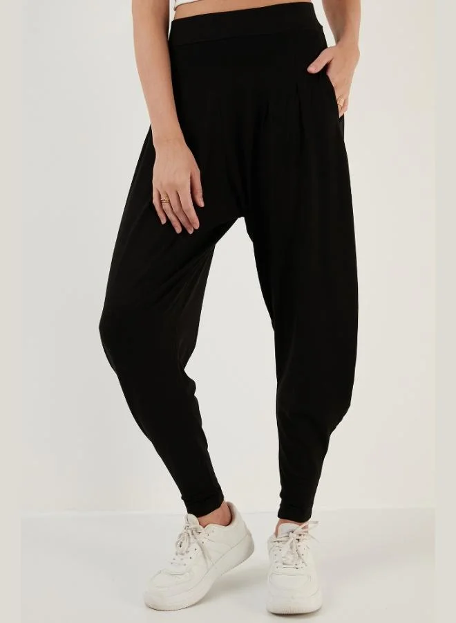 ليلا بنطلون شروال نسائي بخصر عالٍ وقصة مريحة وجيوب