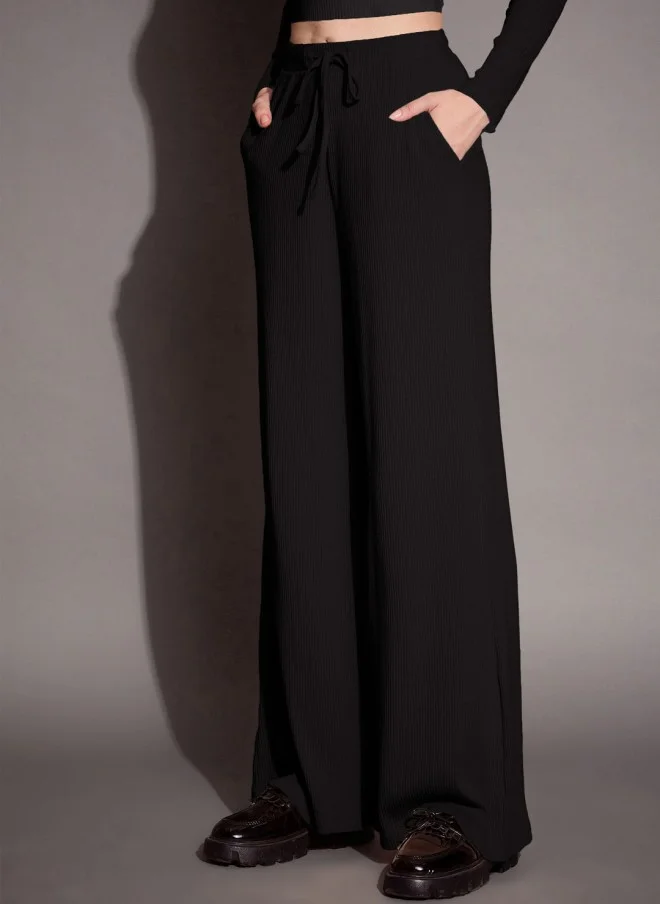 SASSAFRAS Black Relaxed Fit Track Pants for Women