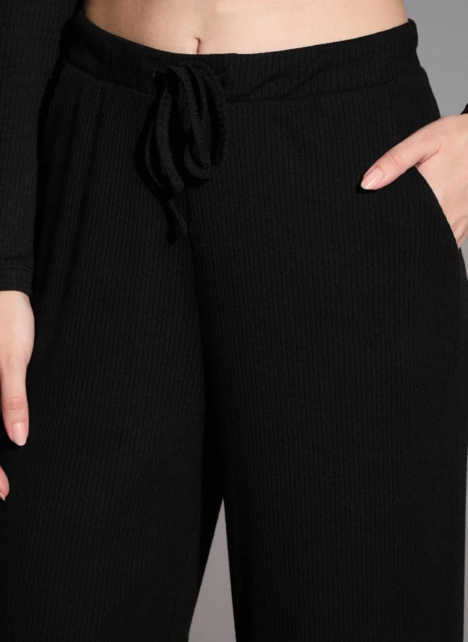 SASSAFRAS Black Relaxed Fit Track Pants for Women