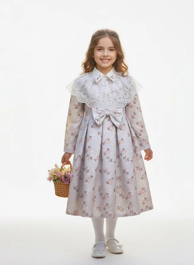 HAWRAA ABAYA Elegant children’s dress with a floral pattern and a lace collar