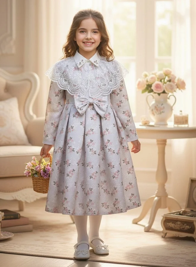 HAWRAA ABAYA Elegant children’s dress with a floral pattern and a lace collar