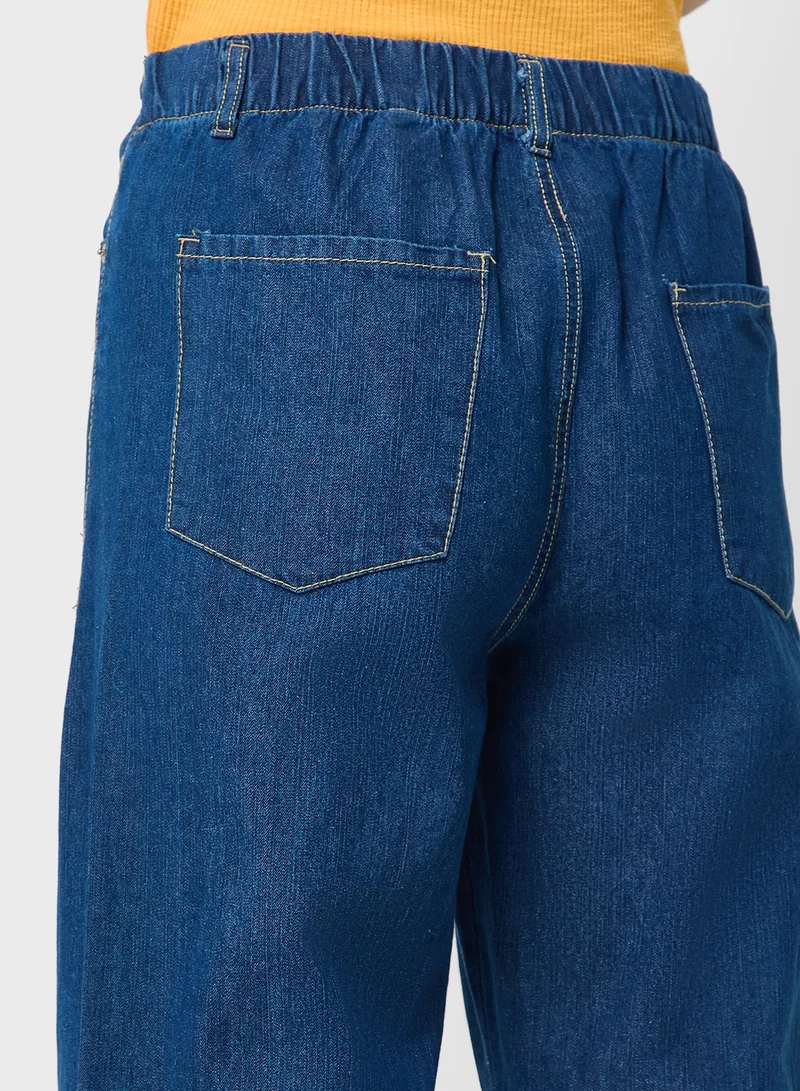 Ginger Mid Rise Wide Leg Jeans