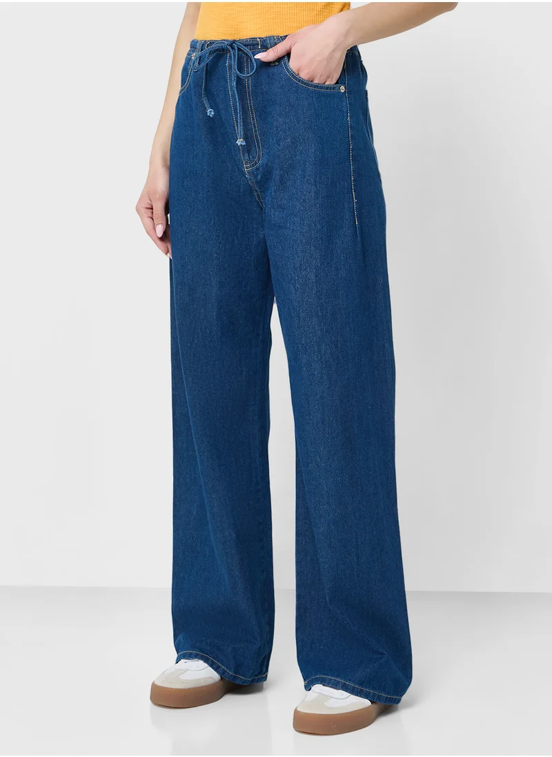 جينجر Mid Rise Wide Leg Jeans