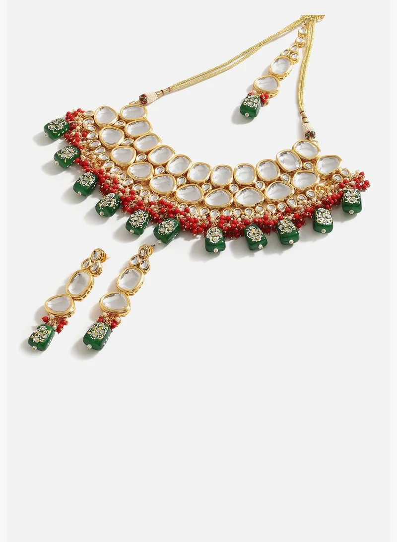 SOHI Gold Plated Designer Kundan Party Necklace, Earring and Maang Tikka Set For Women