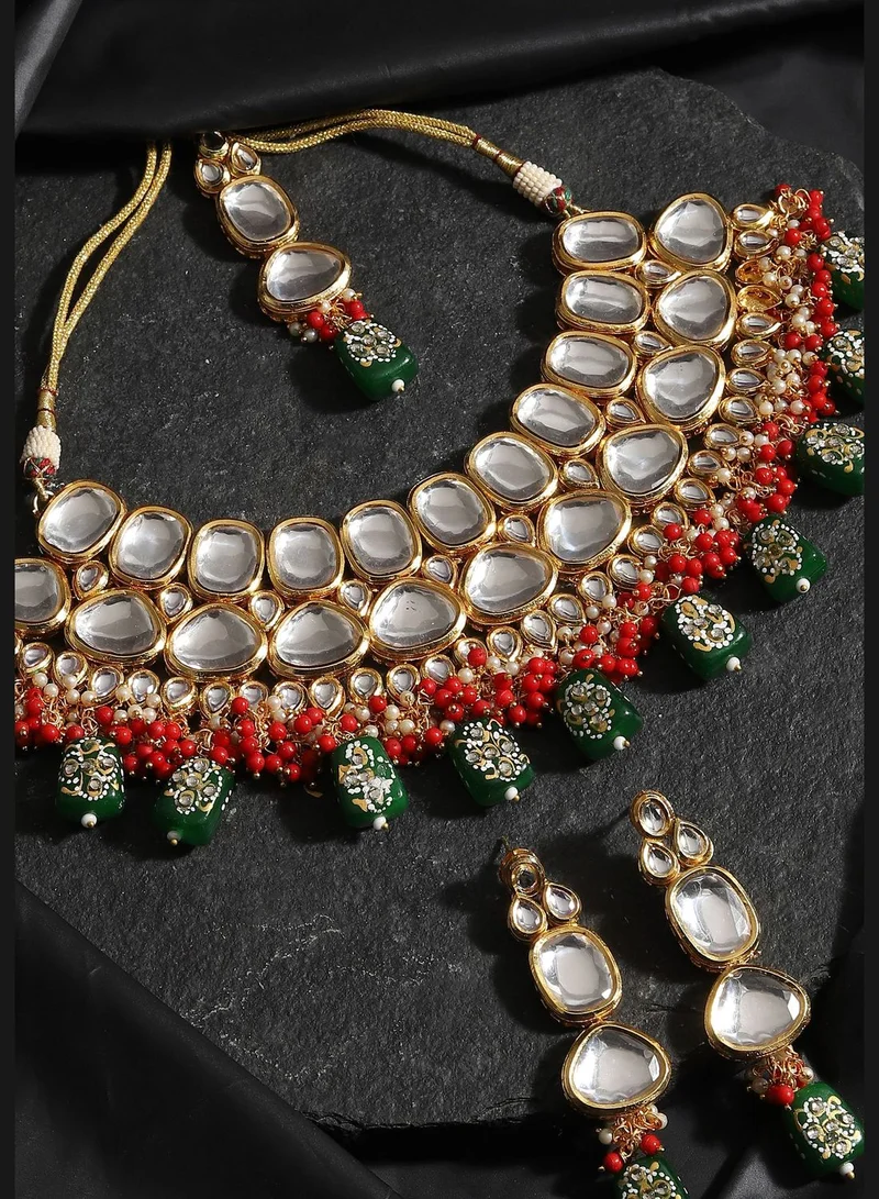 SOHI Gold Plated Designer Kundan Party Necklace, Earring and Maang Tikka Set For Women