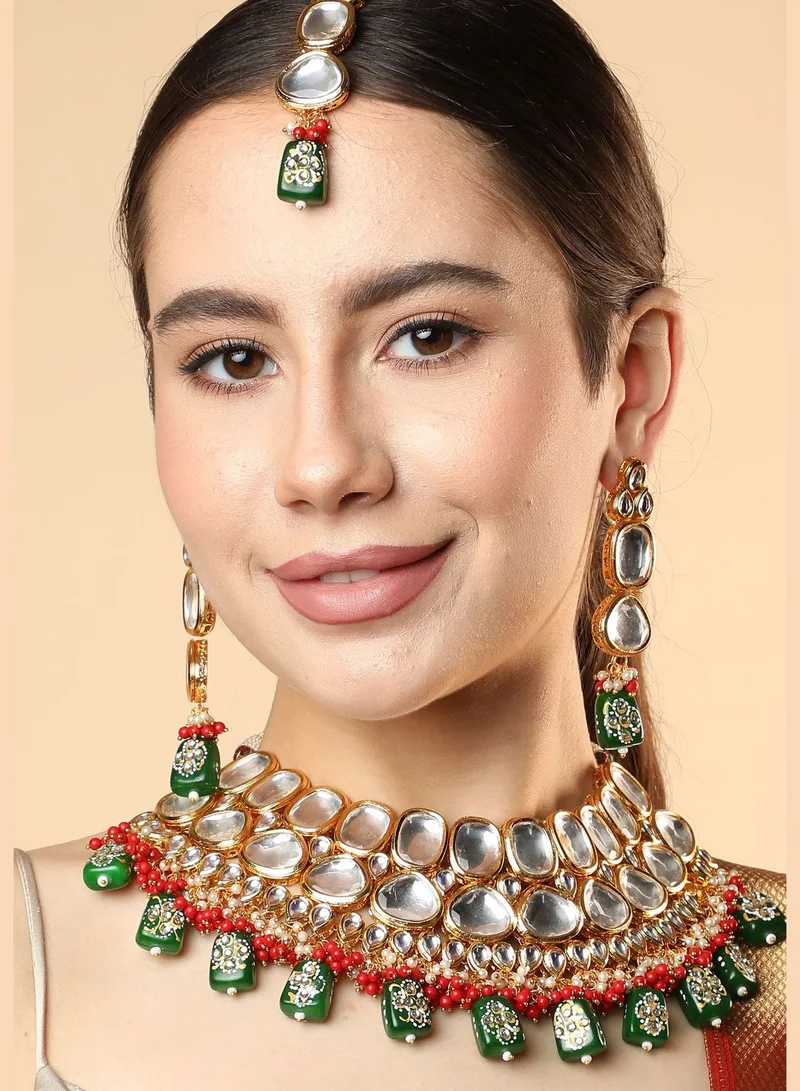 SOHI Gold Plated Designer Kundan Party Necklace, Earring and Maang Tikka Set For Women