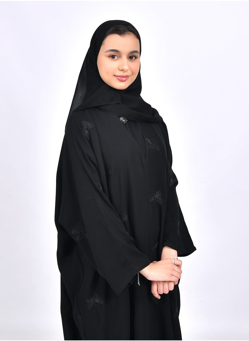 HAWRAA ABAYA - Girls' abaya with a bisht cut and embroidered with scattered butterflies in black - Image 1