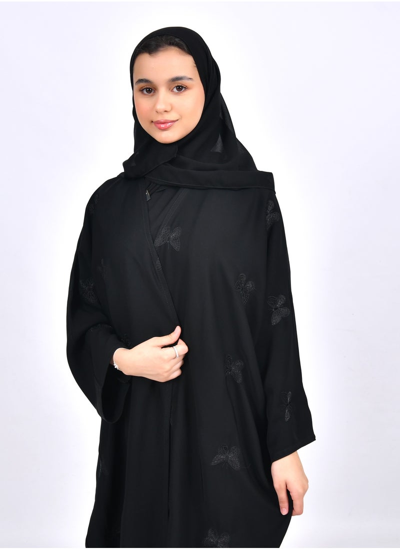 HAWRAA ABAYA - Girls' abaya with a bisht cut and embroidered with scattered butterflies in black - Image 1