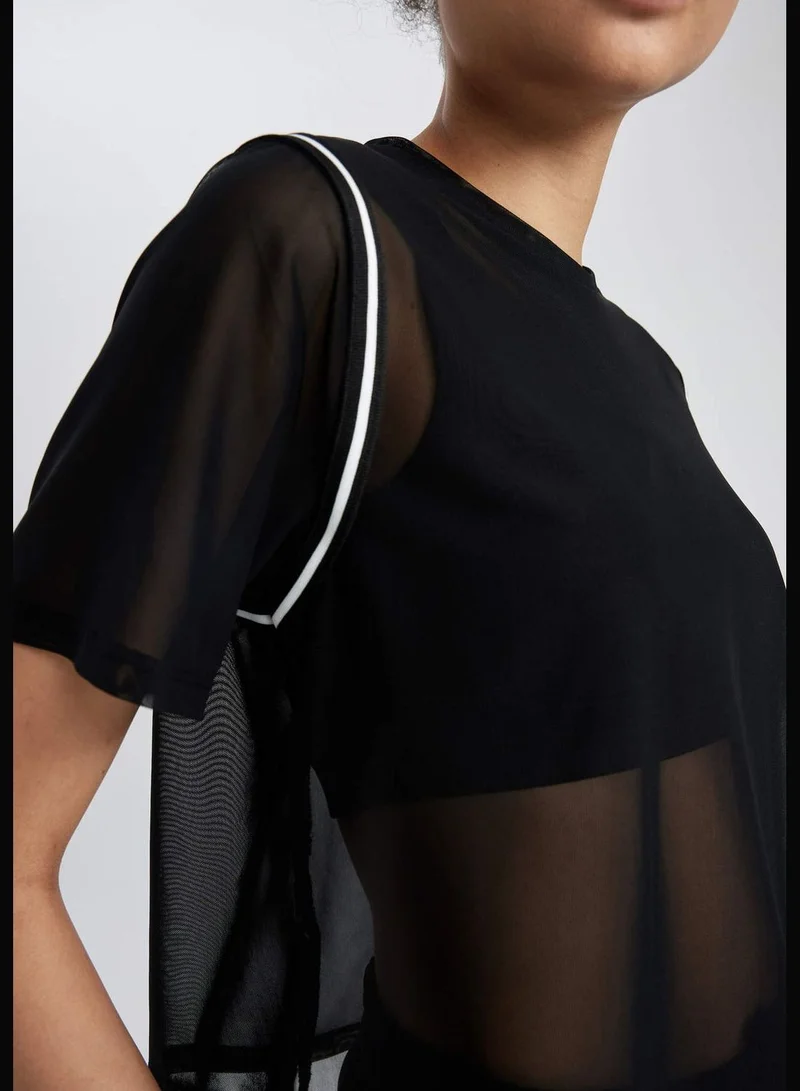 ديفاكتو Woman Cropped Fit Knitted Short Sleeve T-Shirt