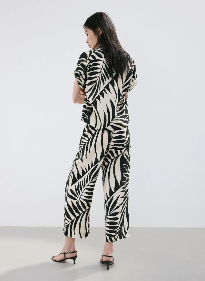 مانجو Tropical print pants