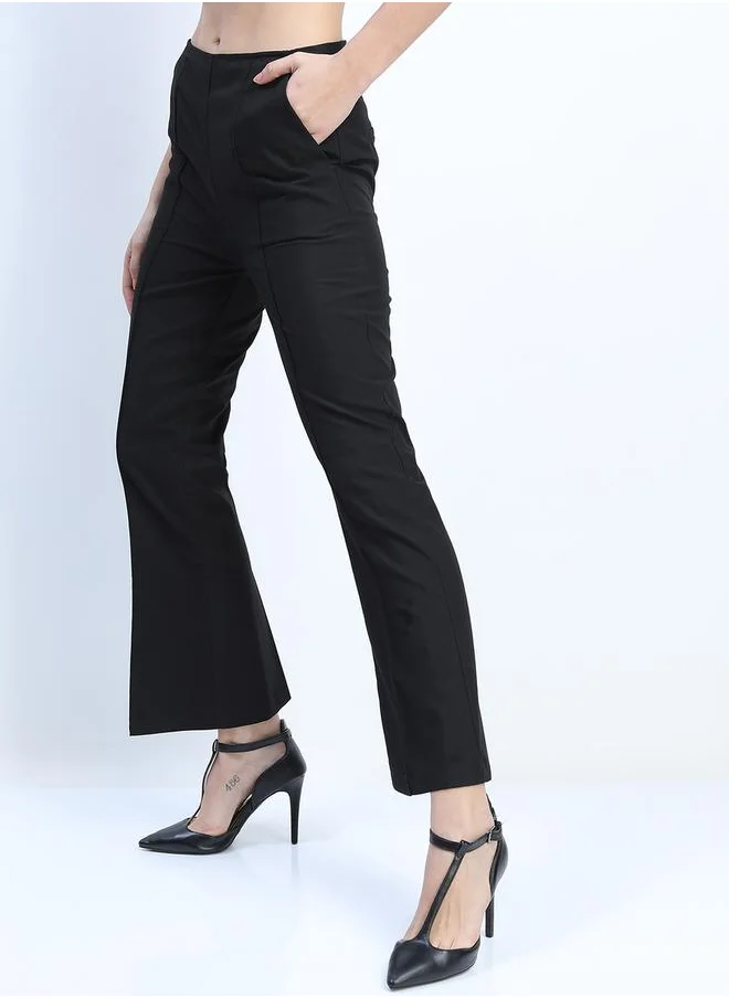 طوكيو توكيز Solid Mid Rise Flared Trousers