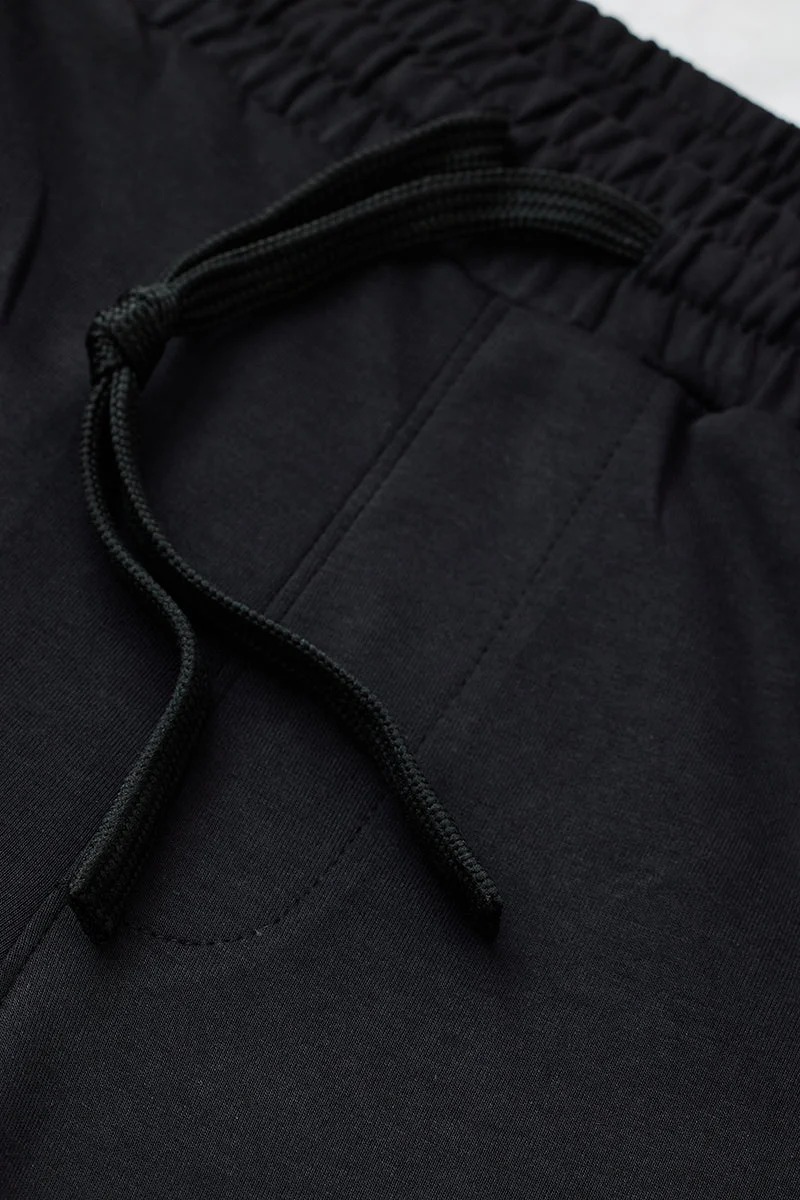 Snitch Black Black Solid Loose Fit Casual Trousers for Men | Best Price UAE