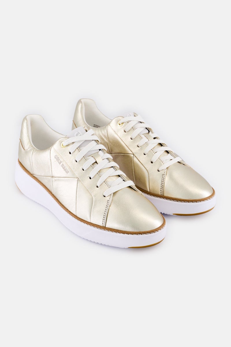 COLE HAAN Women Wide Gp Topspin Lace Up Sneaker, Gold - Image 1