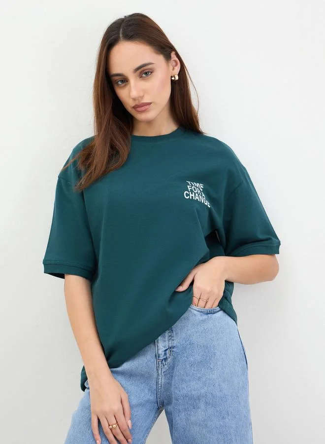 Styli Dark Green Oversized Slogan Print T-Shirt