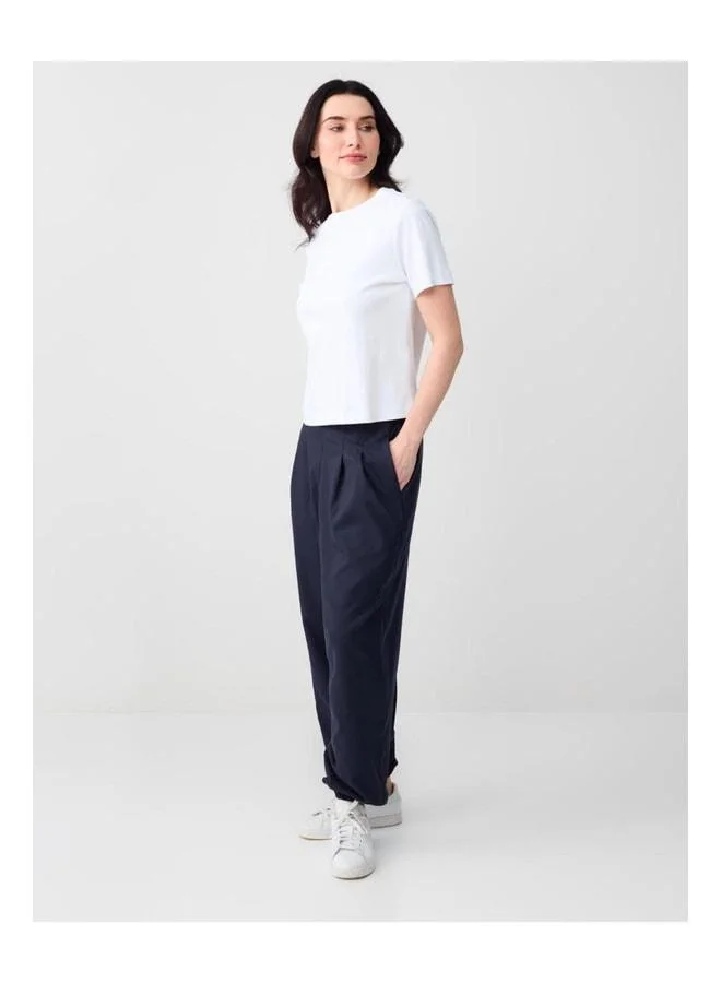 جيمي كي بنطلون كحلي بخصر طبيعي وساقين مطاطيتين منسوج.