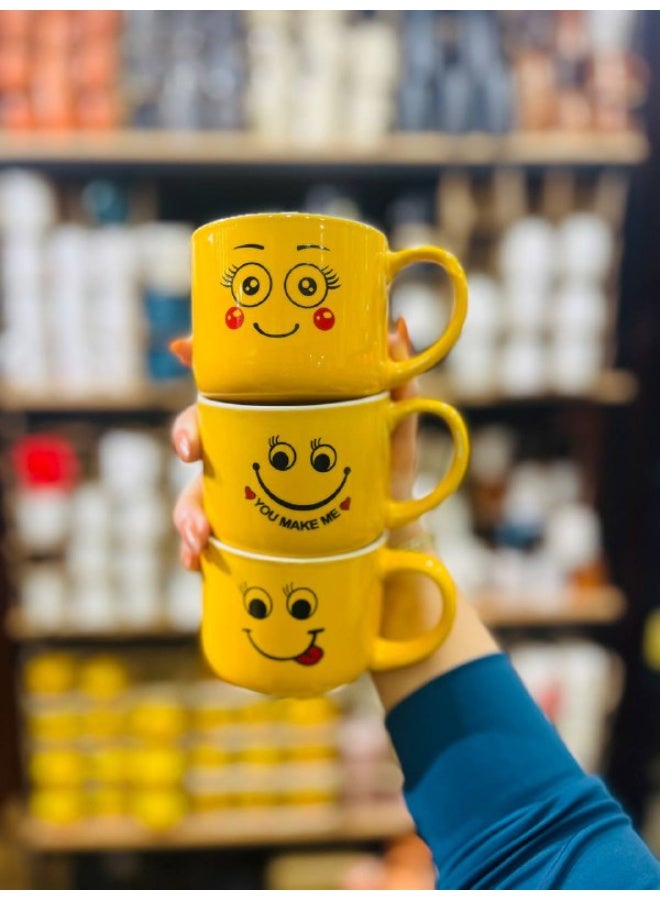 مج بورسلين أصفر مرسوم عليه وجوه إيموجي - Image 1