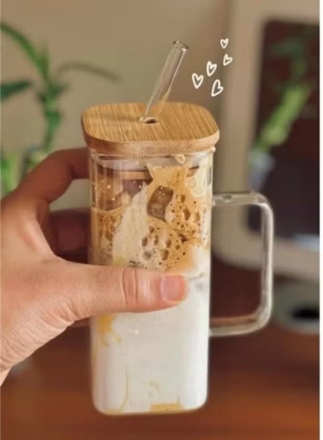 Clear glass mug with a straw and colored handle; glass with a wooden lid; heat-resistant glass cup for iced coffee and various beverages. - Image 1