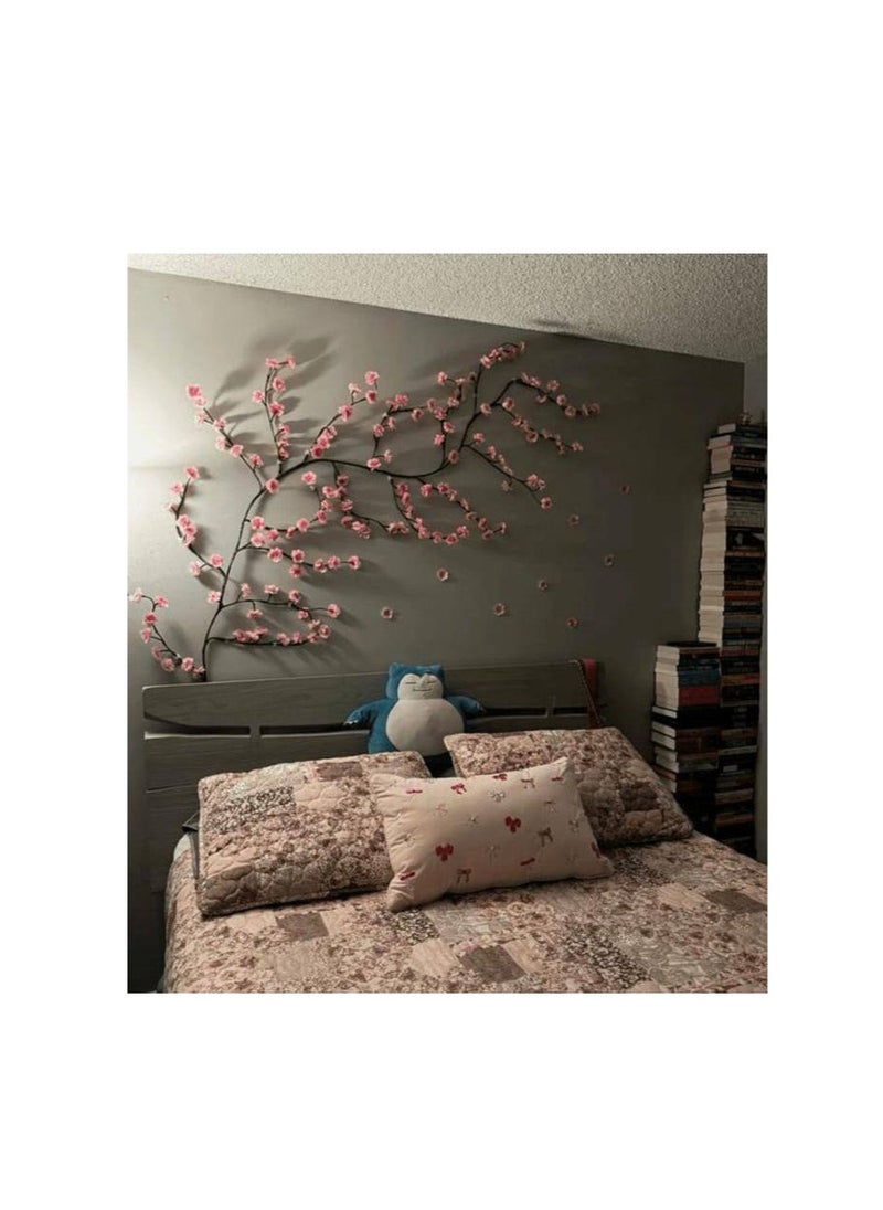 Generic The LED wall tree is a decorative masterpiece that makes the apartment speak with its shape. It is mounted on the walls in the shape of a tree branch, something that catches the eye. Hang it and forget about it. It works all year long. You will find it filling a large space for you, covering any space you want. Add a different and new decorative touch to your home that highlights the beauty of your apartment. It is attached with double-sided tape. The tree comes with 35 foam flowers that you can hang as you wish on the branches. The lighting is fixed yellow and warm. The length is 3 meters from the beginning of the branch to the plug. 100 LED lights. It is electrically operated.  - Image 3