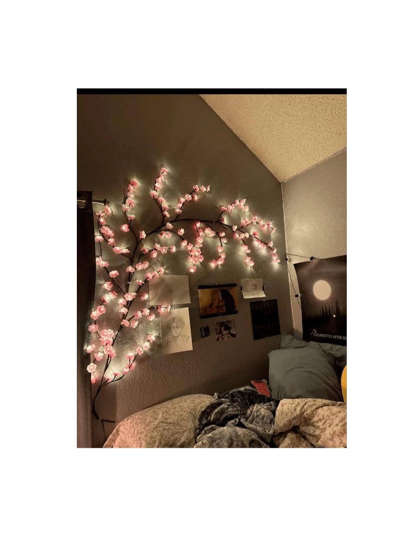 Generic The LED wall tree is a decorative masterpiece that makes the apartment speak with its shape. It is mounted on the walls in the shape of a tree branch, something that catches the eye. Hang it and forget about it. It works all year long. You will find it filling a large space for you, covering any space you want. Add a different and new decorative touch to your home that highlights the beauty of your apartment. It is attached with double-sided tape. The tree comes with 35 foam flowers that you can hang as you wish on the branches. The lighting is fixed yellow and warm. The length is 3 meters from the beginning of the branch to the plug. 100 LED lights. It is electrically operated.  - Image 1