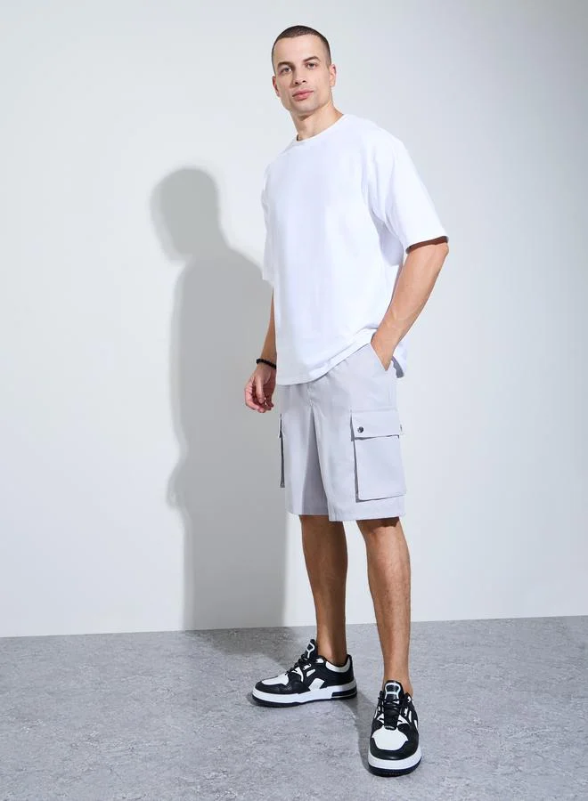 ستايلي Men White Graphic Print Oversized T-Shirt
