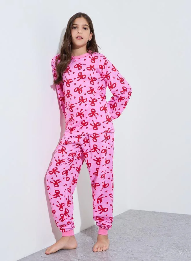 Styli Teen Girls All Over Bow Print Sweatshirt and Cuffed Pants Pyjama Set