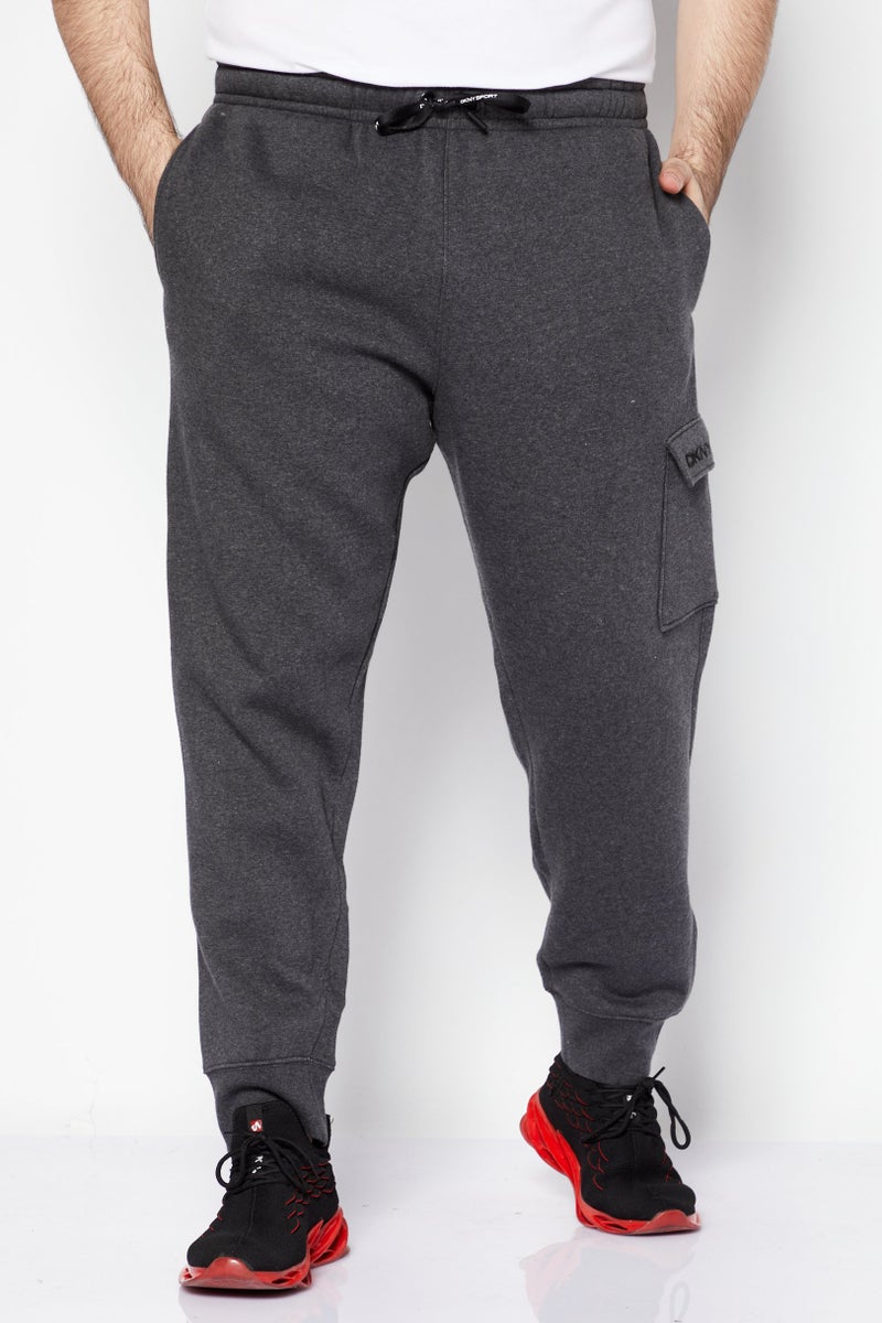 DKNY Sport سراويل تدريب تناسب الرجال الرياضية، فحم - Image 1