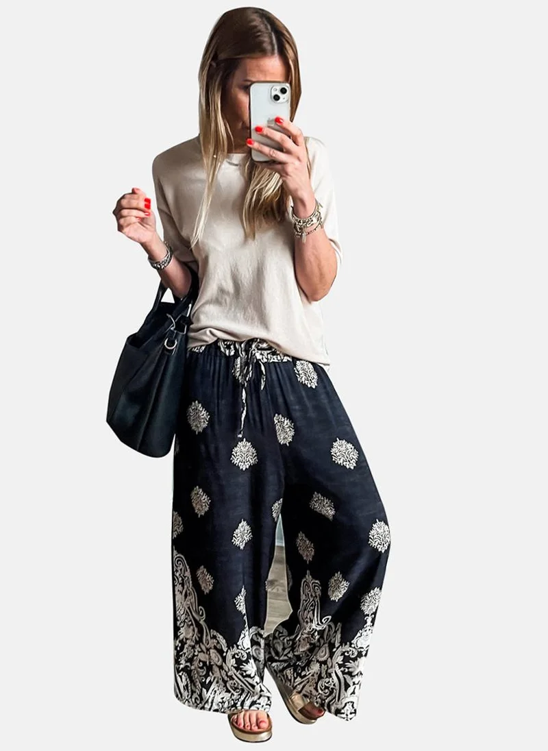 يونيكي Black Printed Casual Trousers