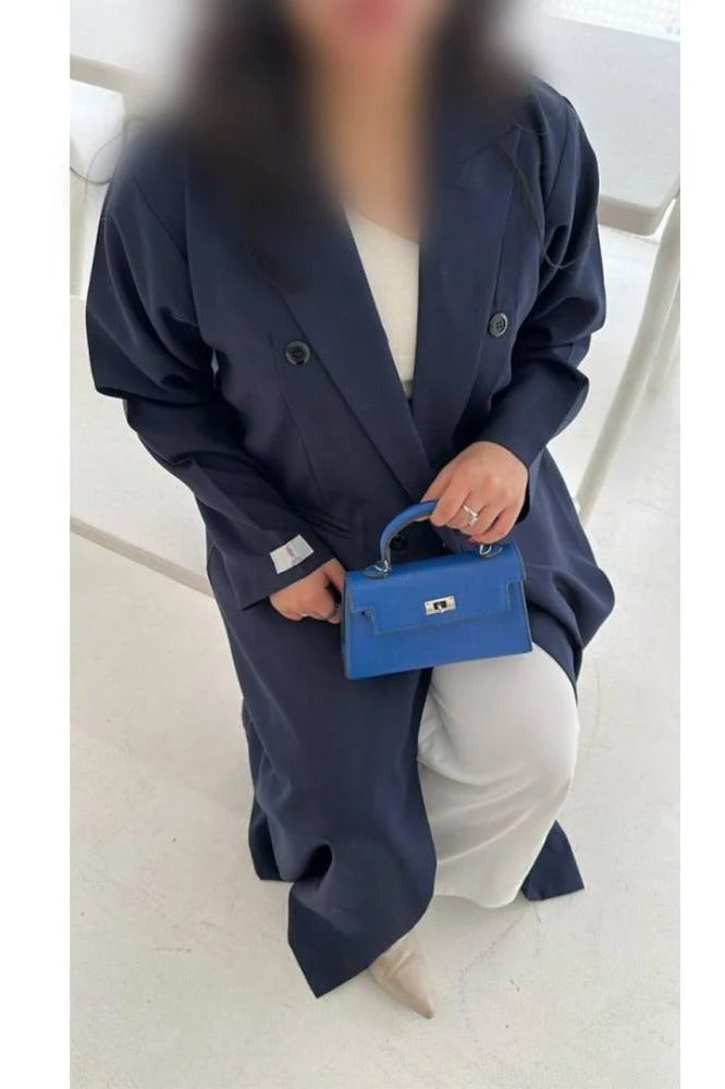 Deem Abaya: A perfect harmony between elegant simplicity and soft details, to give you a calm elegance that speaks beauty in every look. - Image 4
