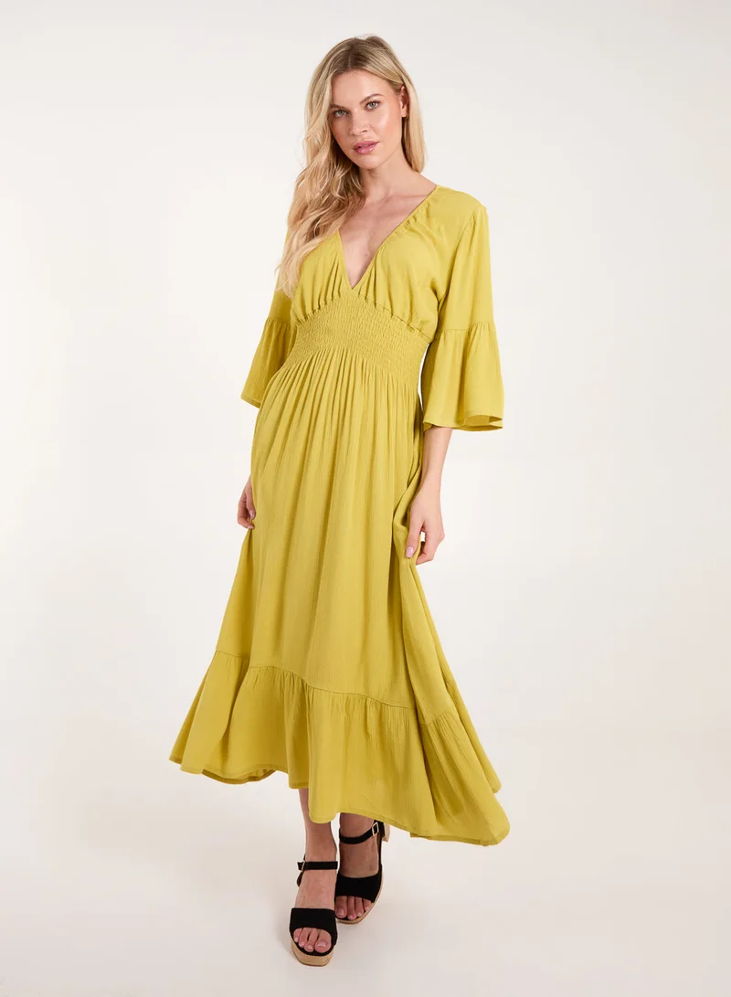 بلو فانيلا فستان إمبراطوري بخصر مرتفع وكسرات