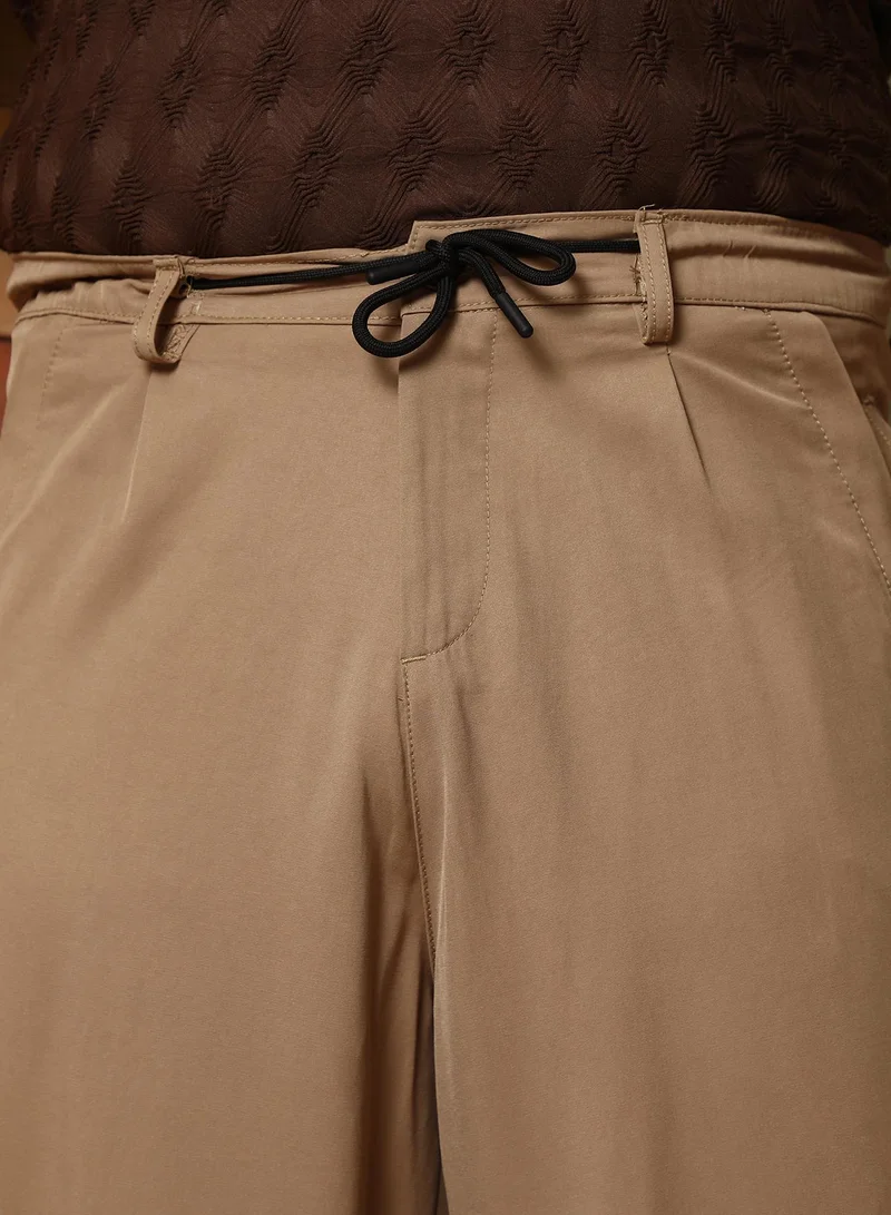 Instafab Plus Instafab Plus Men's Desert Beige Panelled Chino Trousers | Mid-Rise , Straight Hem , Button Closure | Solid Plain Polyester Blend Material For Street & Casual Wear