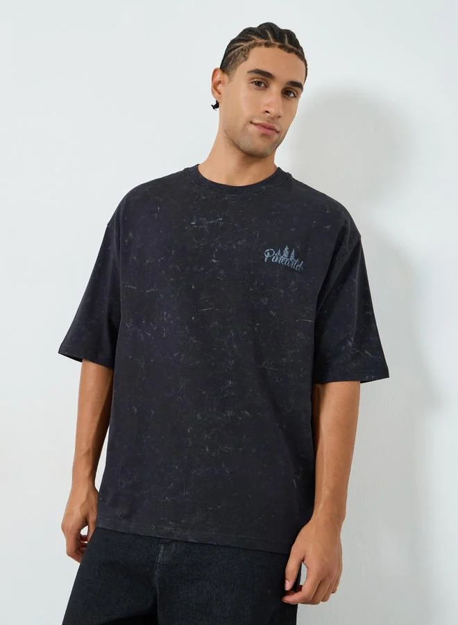 Styli Men Black Graphic Print Oversized T-Shirt