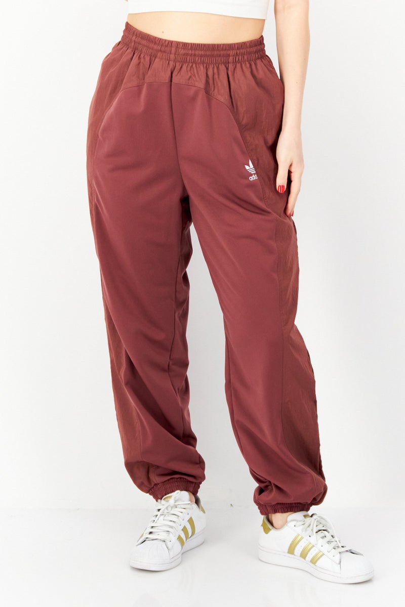 adidas Originals Women Sportswear Fit Training Track Pants, Dark Brown - Image 1