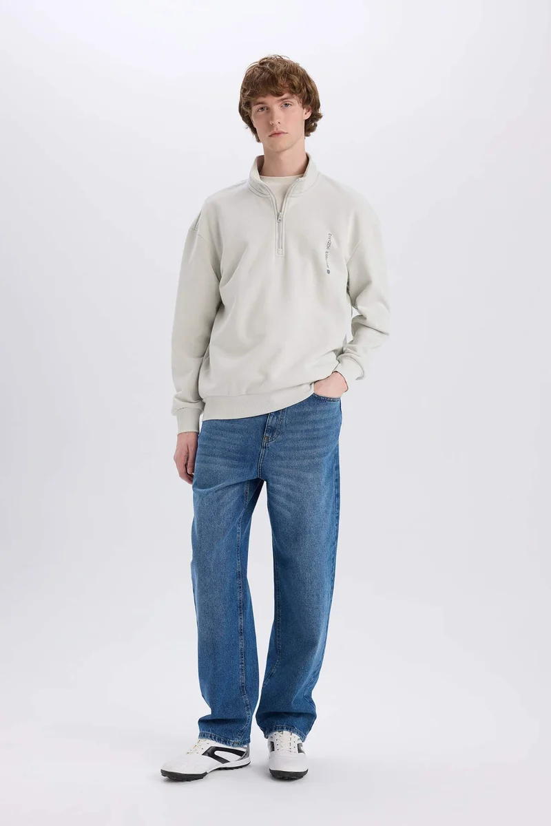 ديفاكتو Boxy Fit Marvel Licensed Printed Long Sleeve Sweatshirt