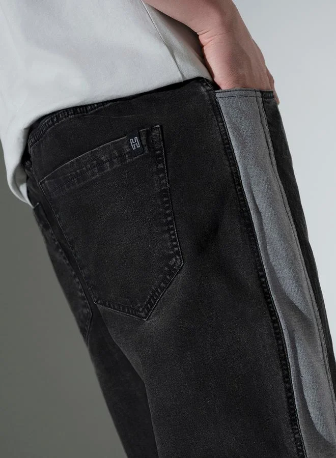 Hubberholme Mid Rise Relaxed Fit Jeans with Side Panel by Styli
