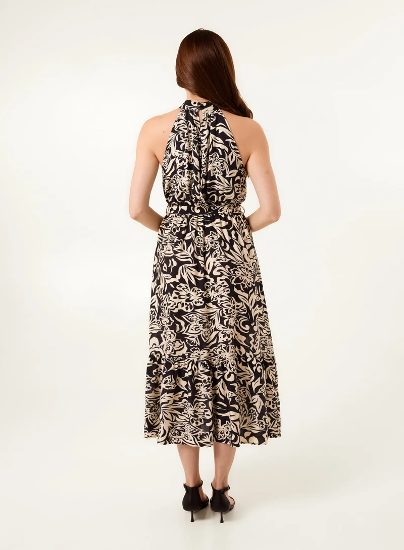 بلو فانيلا فستان ميدي بياقة هالتر وطبعات استوائية وحزام خصر