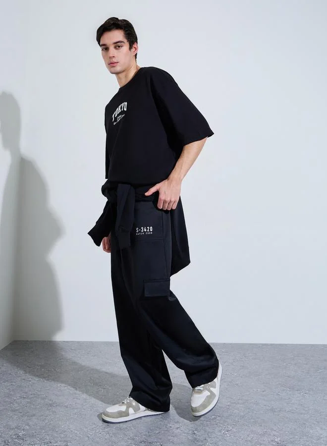 ستايلي Black Graphic Print Crew Neck Oversized T-Shirt