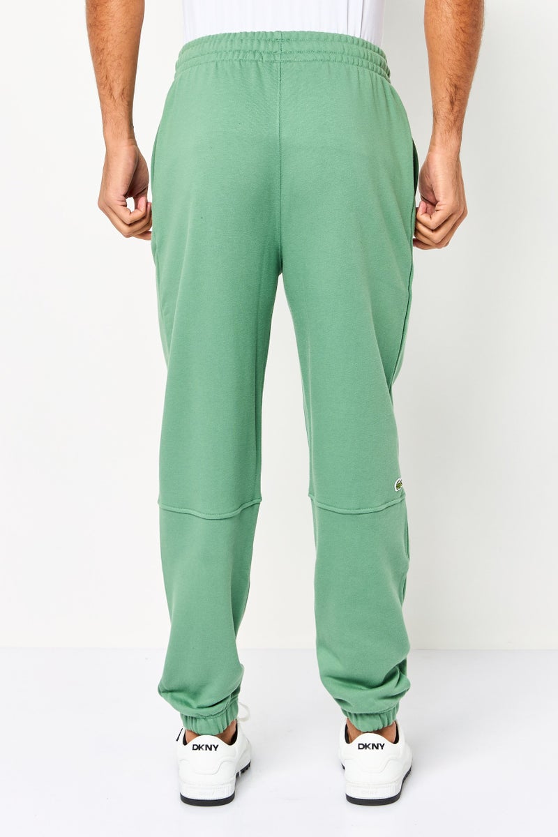 LACOSTE Men Relaxed Fit Embroidered Logo Sweatpants, Green - Image 4
