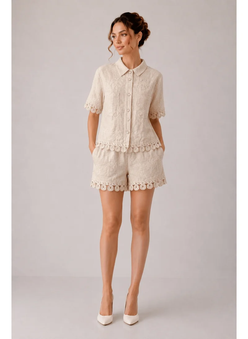 2Trendy Women's Beige Short Sleeve Embroidered Blouse with Shirt Collar and Lace Trim