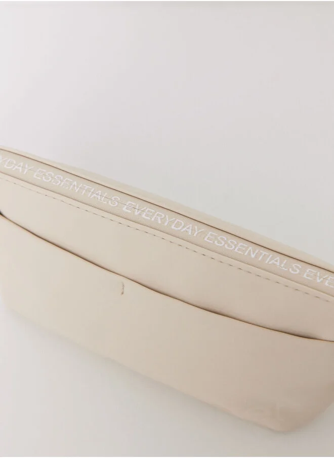 women'secret Small beige rubber toiletry bag