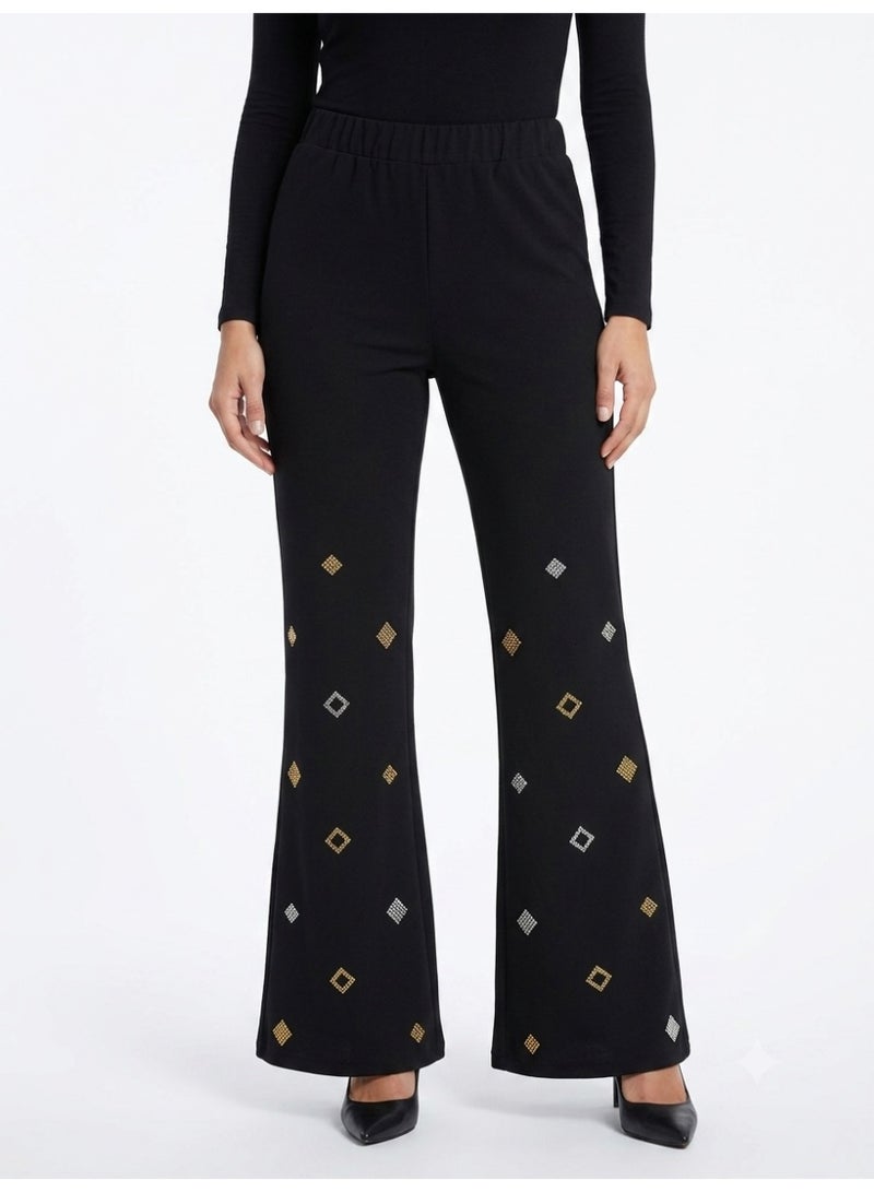 Women black flare pants lycra with gold and silver rhinestones - Image 1
