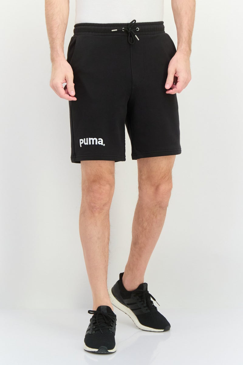 PUMA شورت تدريب للرجال بقصة مريحة بطول 8 إنش، أسود - Image 1